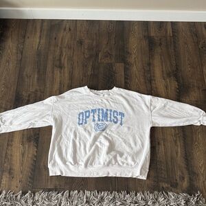 Old Navy White Crewneck Sweatshirt with Light Blue "OPTIMIST" Graphic